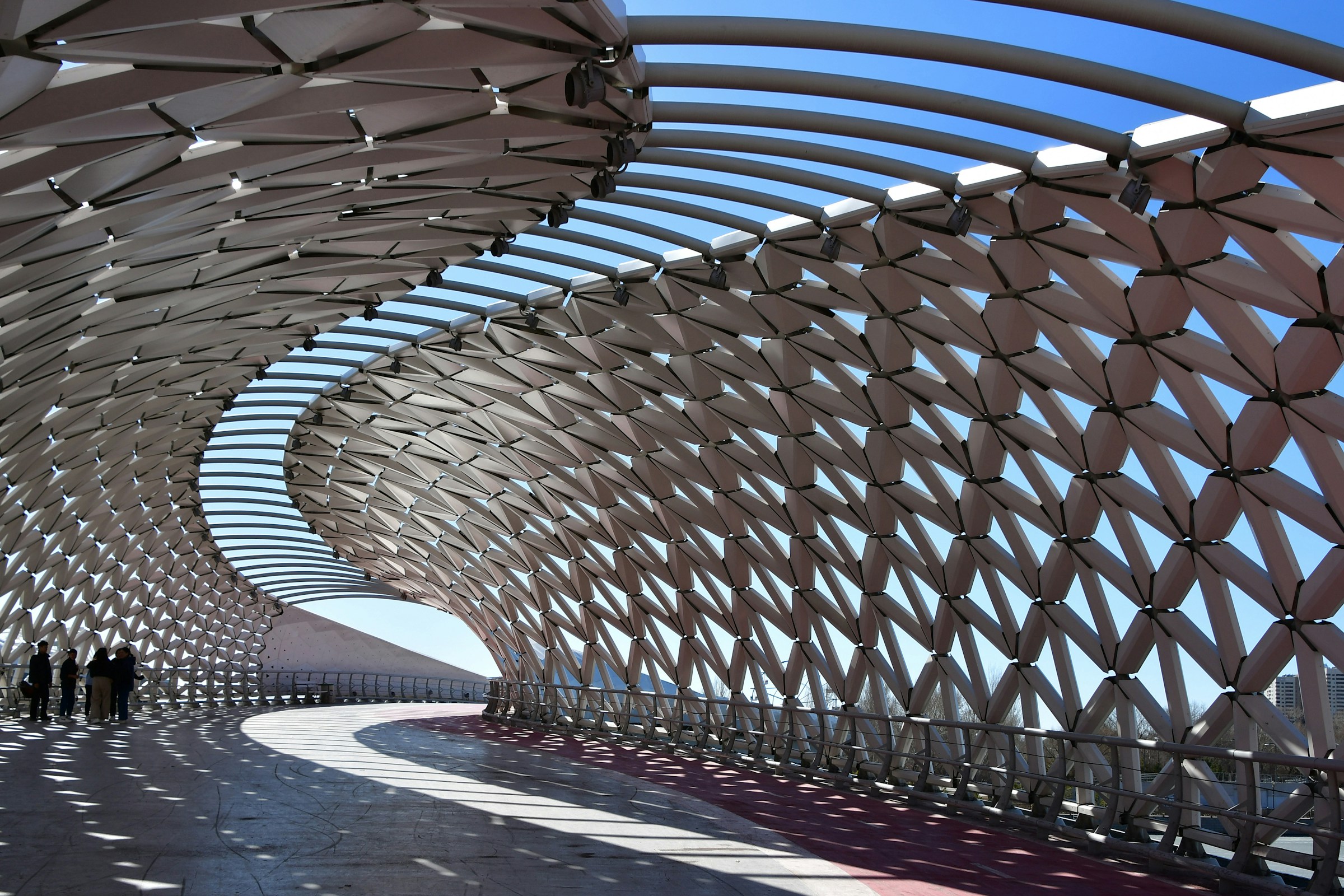 background image of a walkable bridge in Astana